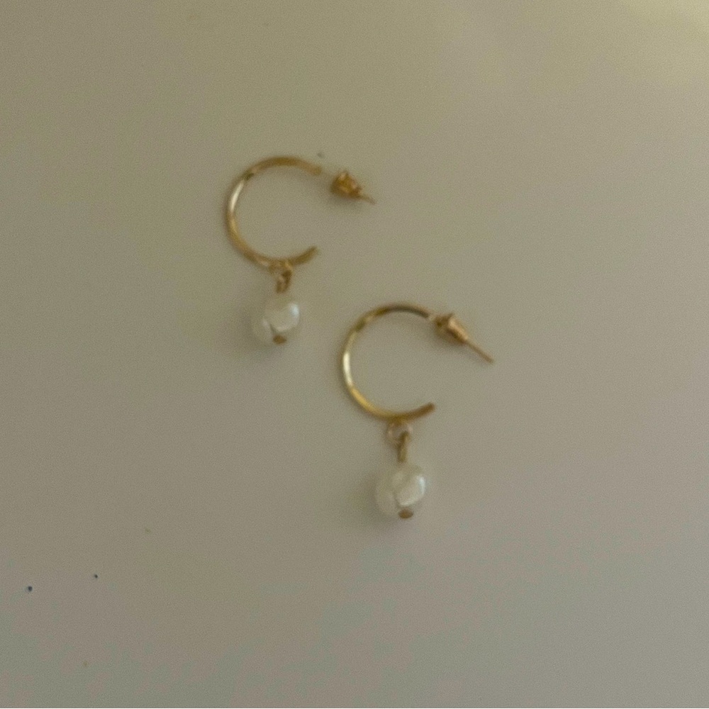 Gold hoops with dangling pearl